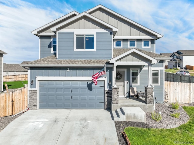 craftsman house with a garage