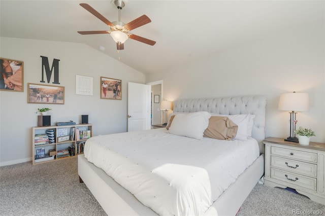 carpeted bedroom featuring lofted ceiling and ceiling fan