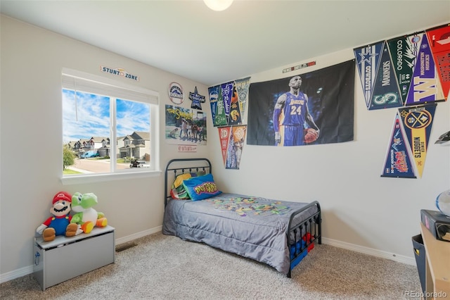 bedroom featuring carpet