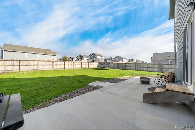 view of patio / terrace with a fire pit