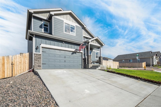 craftsman-style home with a garage