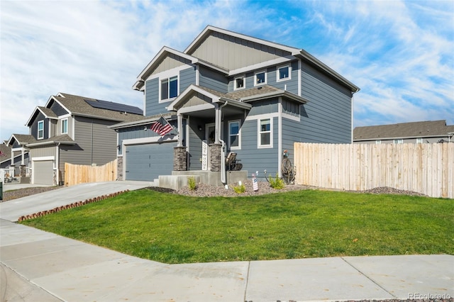 craftsman house featuring a front lawn