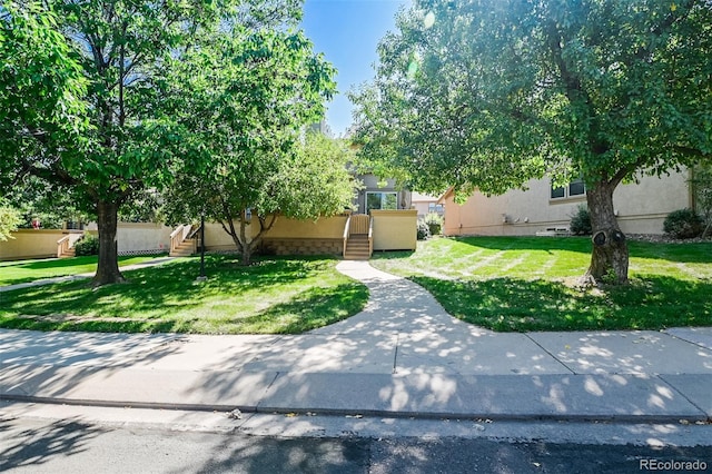 view of front of house with a front lawn