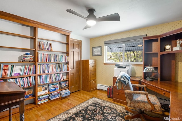 9765 W 77th Dr, Arvada, CO 80005 - office space with wallpapered walls, baseboard heating, wood finished floors, and a ceiling fan
