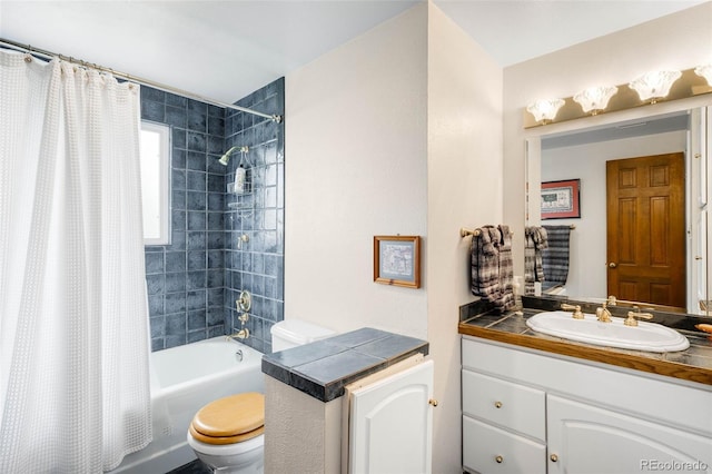 9765 W 77th Dr, Arvada, CO 80005 - full bathroom with toilet, shower / tub combo, and vanity