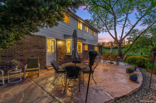 9765 W 77th Dr, Arvada, CO 80005 - view of patio / terrace featuring outdoor dining area