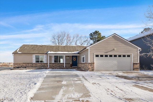 single story home with a garage