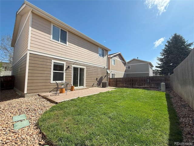 10676 Forester Pl, Longmont, CO 80504 - rear view of house featuring central AC unit and a patio area