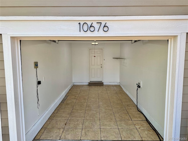 10676 Forester Pl, Longmont, CO 80504 - entrance to property with a garage