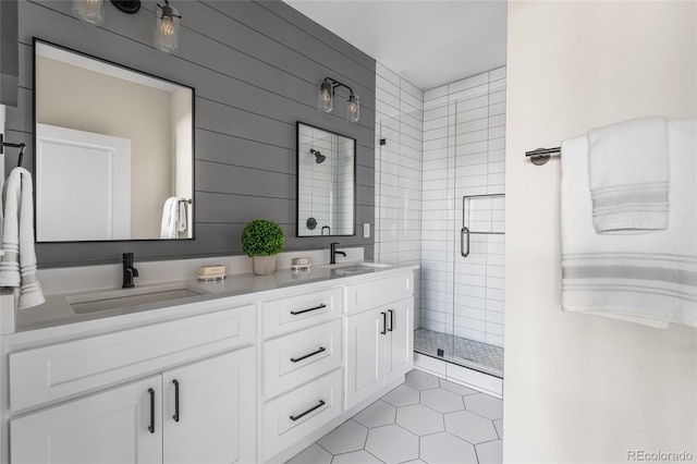 1305 Osceola St, Denver, CO 80204 - full bathroom featuring double vanity, a shower stall, and tile patterned floors