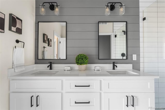 1305 Osceola St, Denver, CO 80204 - bathroom featuring double vanity