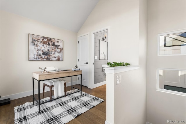 1305 Osceola St, Denver, CO 80204 - hall featuring vaulted ceiling, dark wood-type flooring, baseboards, and a desk