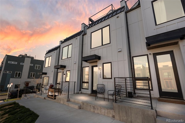 1305 Osceola St, Denver, CO 80204 - back of property at dusk featuring board and batten siding