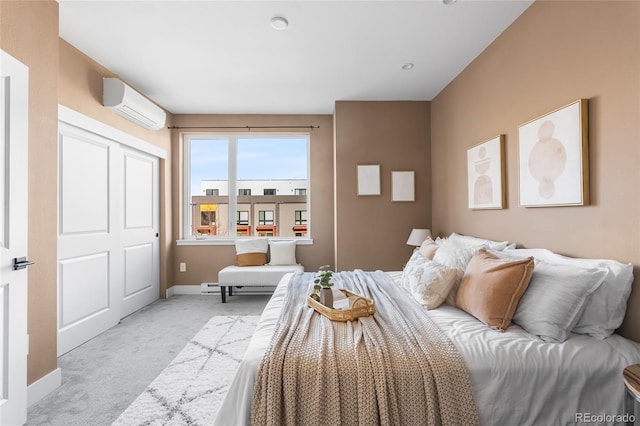 1305 Osceola St, Denver, CO 80204 - bedroom featuring a wall unit AC, light colored carpet, and baseboards