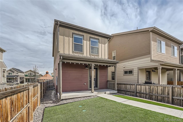 12770 Tamarac St, Thornton, CO 80602 - back of property featuring a fenced backyard and board and batten siding
