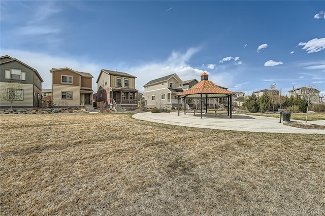 12770 Tamarac St, Thornton, CO 80602 - view of home's community with a gazebo, a residential view, and a lawn