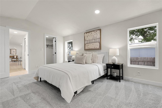 8497 Madison Way, Denver, CO 80229 - carpeted bedroom with recessed lighting, baseboards, and a walk in closet