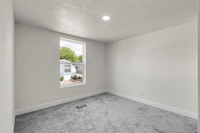 8497 Madison Way, Denver, CO 80229 - carpeted empty room featuring a textured ceiling, baseboards, and recessed lighting