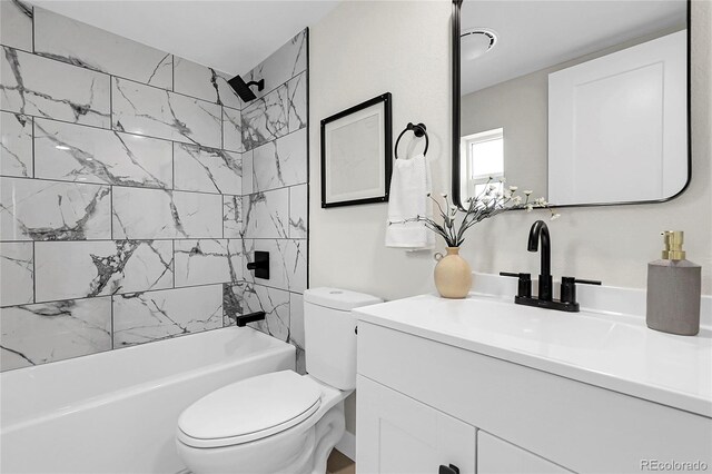 8497 Madison Way, Denver, CO 80229 - bathroom with vanity, shower / washtub combination, and toilet