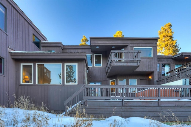 965 Four Oclock Rd, Breckenridge, CO 80424 - snow covered rear of property with a balcony