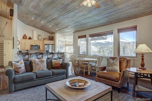965 Four Oclock Rd, Breckenridge, CO 80424 - living room featuring wood ceiling, wood finished floors, track lighting, a ceiling fan, and a chandelier