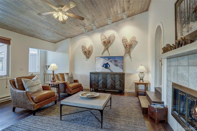 965 Four Oclock Rd, Breckenridge, CO 80424 - living area with wooden ceiling, ceiling fan, wood finished floors, and a fireplace
