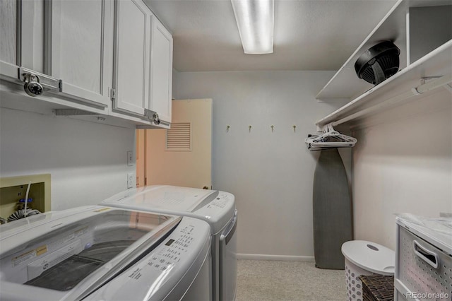 965 Four Oclock Rd, Breckenridge, CO 80424 - washroom featuring cabinet space, washing machine and clothes dryer, and light colored carpet