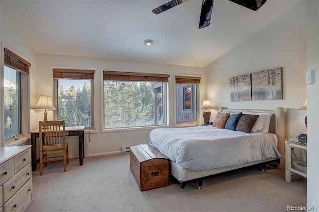 965 Four Oclock Rd, Breckenridge, CO 80424 - bedroom with multiple windows, lofted ceiling, light carpet, and a baseboard radiator