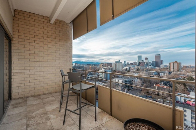 balcony featuring a city view