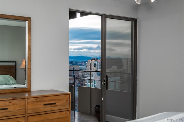 bedroom with a city view