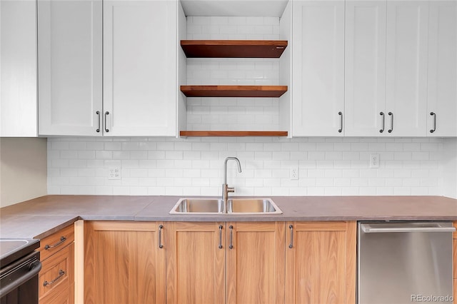 kitchen with white cabinetry, a sink, and open shelves