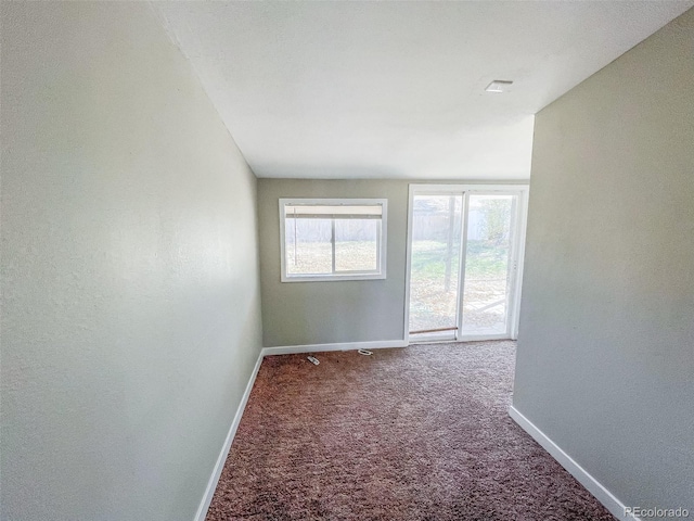 view of carpeted spare room