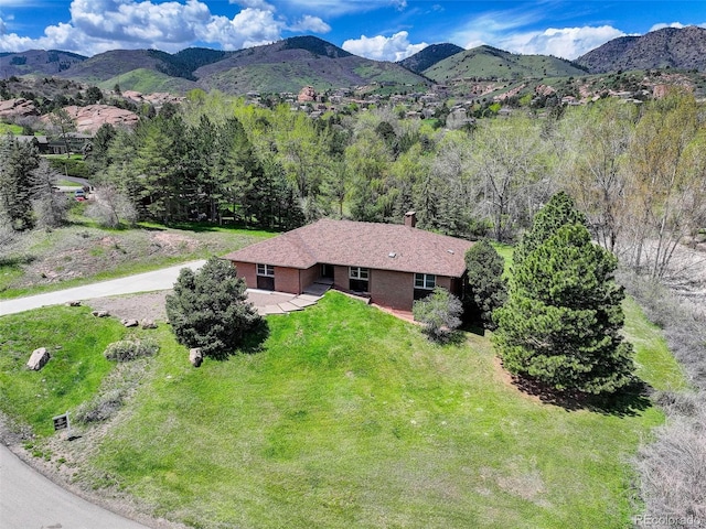 6155 Meadowbrook Dr, Morrison, CO 80465 - aerial view of property and surrounding area featuring a mountainous background