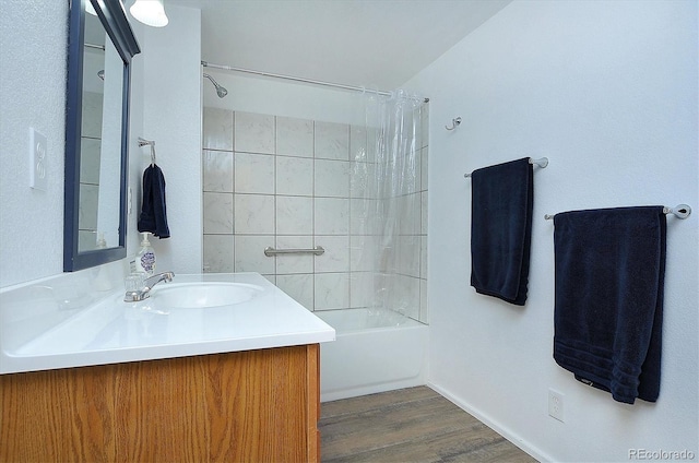 18340 S Lake Rd, Buena Vista, CO 81211 - bathroom with vanity, washtub / shower combination, and wood finished floors