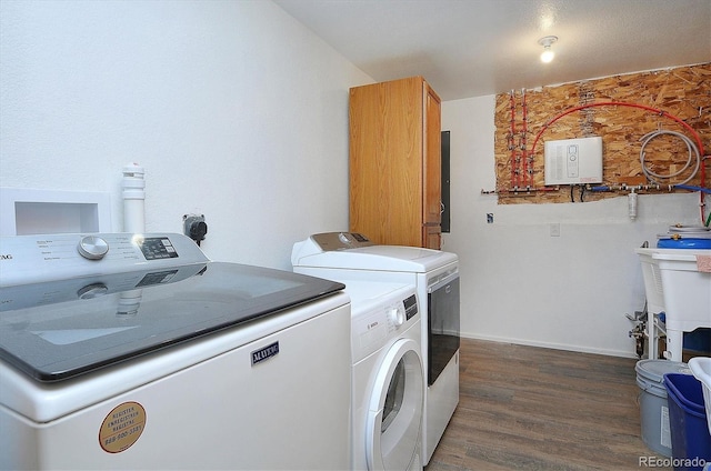 18340 S Lake Rd, Buena Vista, CO 81211 - washroom with washer and dryer and dark wood-type flooring