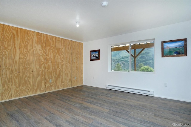 18340 S Lake Rd, Buena Vista, CO 81211 - spare room with a baseboard radiator, wood finished floors, and a smoke detector