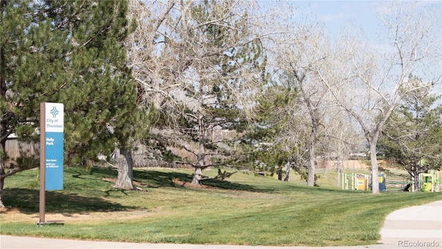 surrounding community featuring a lawn