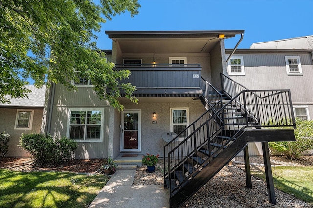 7165 S Gaylord St Unit H05, Centennial, CO 80122 - view of front of property with stairs and stucco siding