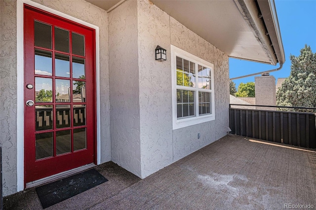 7165 S Gaylord St Unit H05, Centennial, CO 80122 - view of exterior entry featuring stucco siding