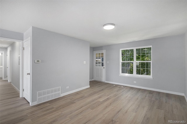 7165 S Gaylord St Unit H05, Centennial, CO 80122 - unfurnished room featuring wood finished floors