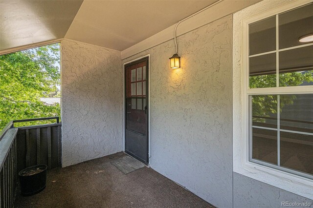 7165 S Gaylord St Unit H05, Centennial, CO 80122 - entrance to property featuring stucco siding and a balcony