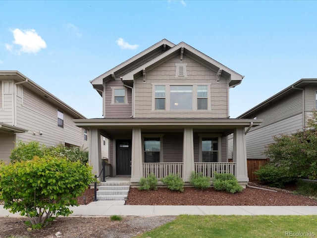 5716 Boston Ct, Denver, CO 80238 - craftsman-style home featuring covered porch
