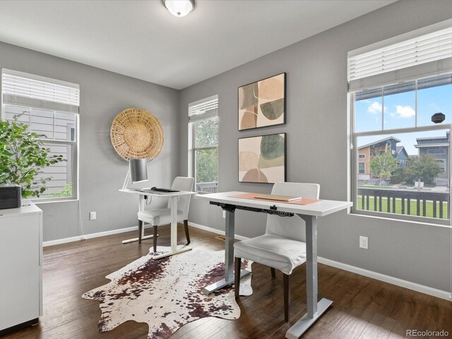 5716 Boston Ct, Denver, CO 80238 - home office with wood finished floors and baseboards