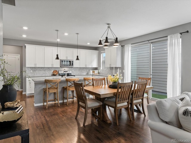 5716 Boston Ct, Denver, CO 80238 - dining area featuring recessed lighting and dark wood-style flooring