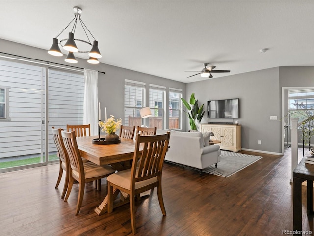 5716 Boston Ct, Denver, CO 80238 - dining space with a ceiling fan, dark wood finished floors, baseboards, and a chandelier