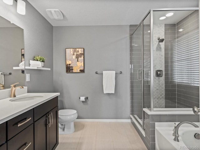 5716 Boston Ct, Denver, CO 80238 - full bath featuring vanity, toilet, a garden tub, and a stall shower