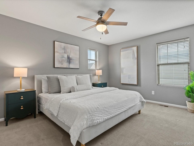 5716 Boston Ct, Denver, CO 80238 - bedroom featuring light colored carpet, baseboards, and a ceiling fan