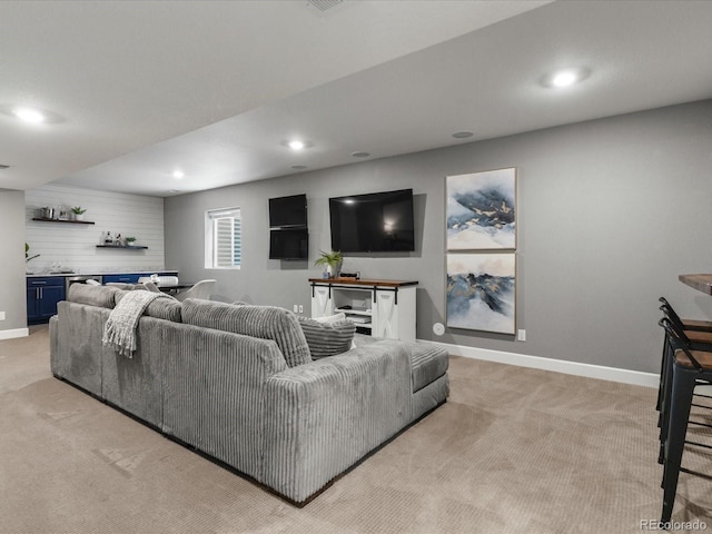 5716 Boston Ct, Denver, CO 80238 - living room featuring light carpet, wet bar, baseboards, and recessed lighting