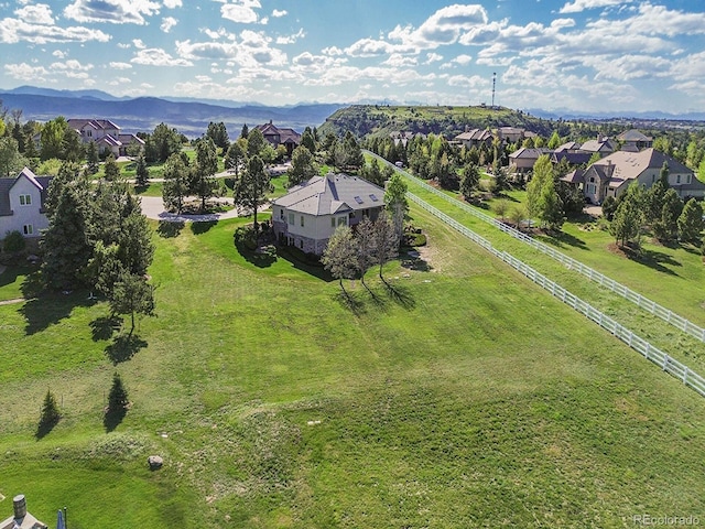 aerial perspective of suburban area with a mountain backdrop