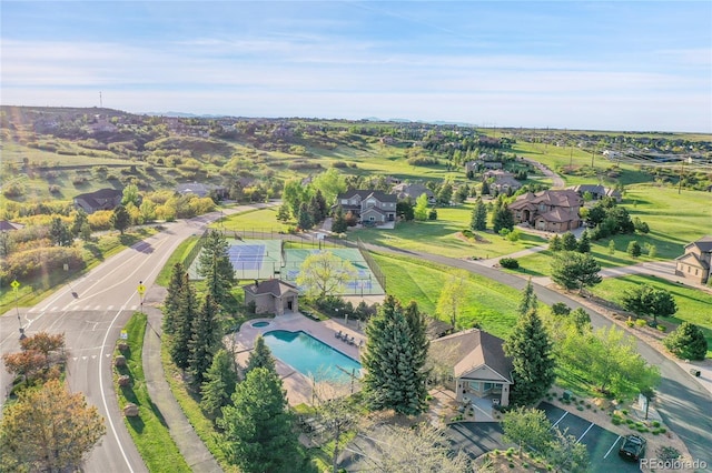 aerial view of residential area with a pool